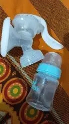 Manual Breast Pump For Feeding Mothers | Anti Colic & BPA Free | Compact & Lightweight | Easy to hold | Easy to Clean | With Bottle (150 ml)