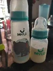 2-in-1 Baby Feeding Bottle | BPA Free with Anti-Colic Nipple & Spoon | Easy Flow Neck Design - Lion & Giraffe 125ml & 250ml