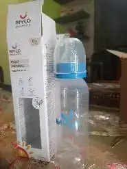 2-in-1 Baby Feeding Bottle | BPA Free with Anti-Colic Nipple & Spoon | Easy Flow Neck Design - Lion & Giraffe 125ml & 250ml