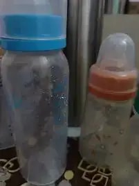 2-in-1 Baby Feeding Bottle | BPA Free with Anti-Colic Nipple & Spoon | Easy Flow Neck Design - Lion & Giraffe 125ml & 250ml