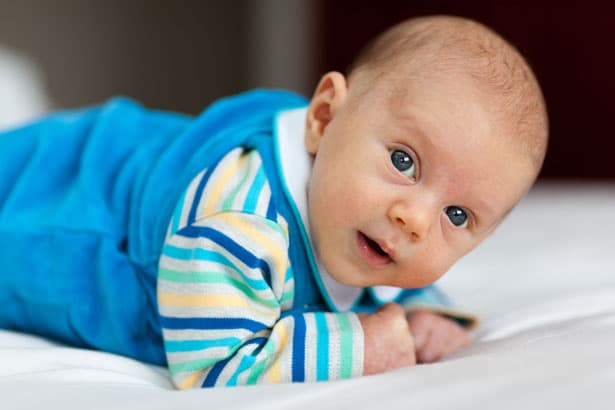 Activity This Week: Towel Slide Ride, week 21: A slow, steady tummy-down ride on a thick towel that gives baby a new sensation and strengthens neck…