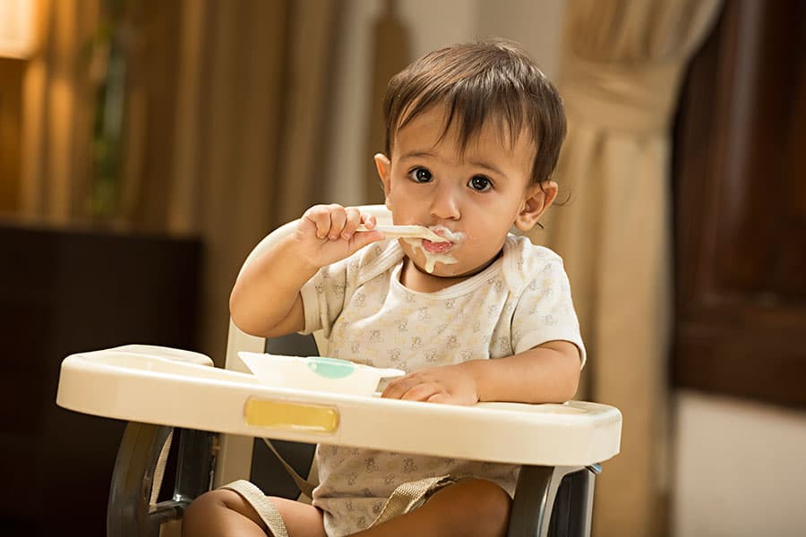 Your Baby's Development, week 28: Your baby still can't really manage a spoon, but that won't stop them trying to run the whole meal.…