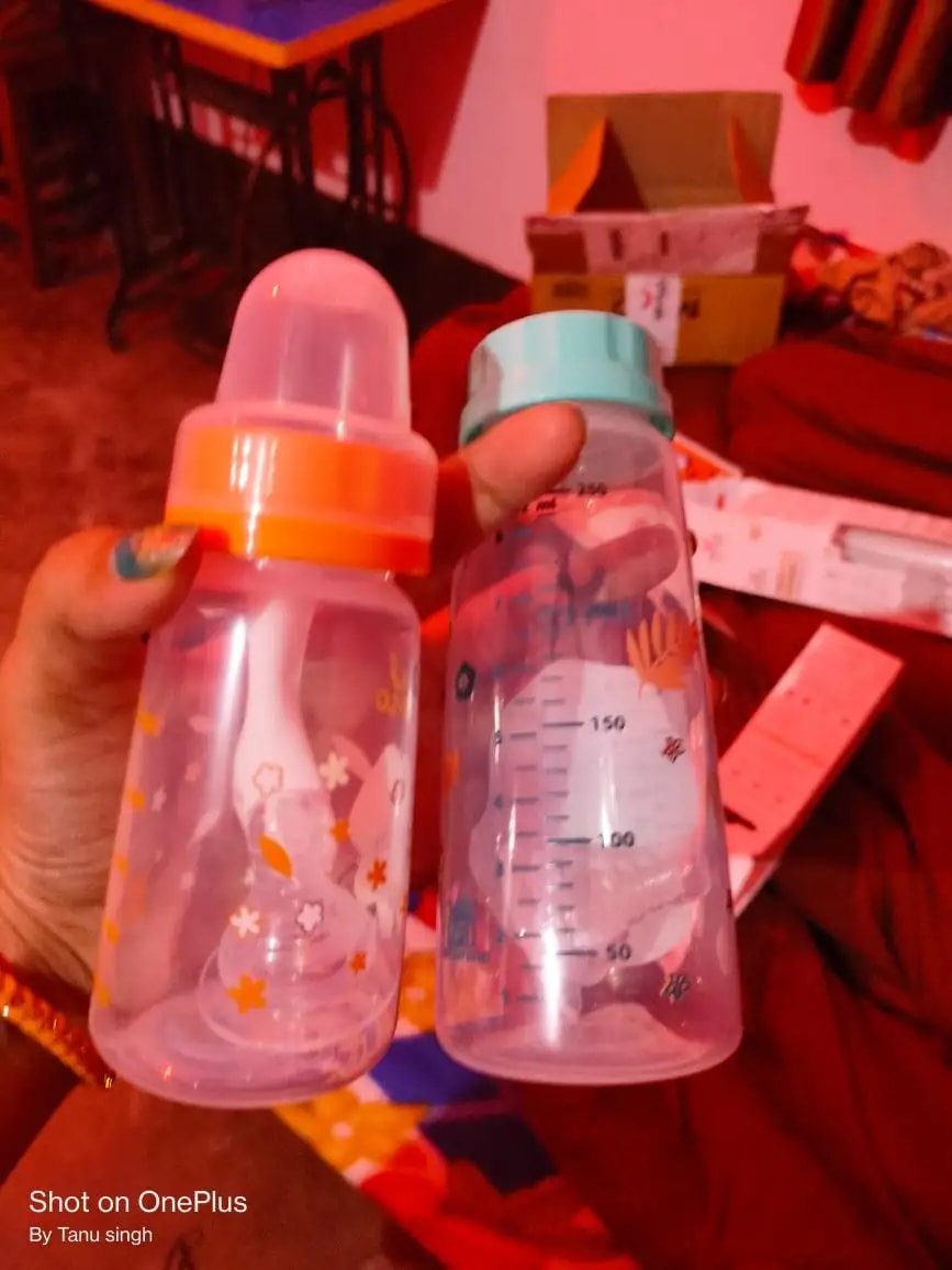 2-in-1 Baby Feeding Bottle | BPA Free with Anti-Colic Nipple & Spoon | Easy Flow Neck Design - Lion & Giraffe 125ml & 250ml