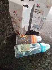 2-in-1 Baby Feeding Bottle | BPA Free with Anti-Colic Nipple & Spoon | Easy Flow Neck Design - Lion & Giraffe 125ml & 250ml