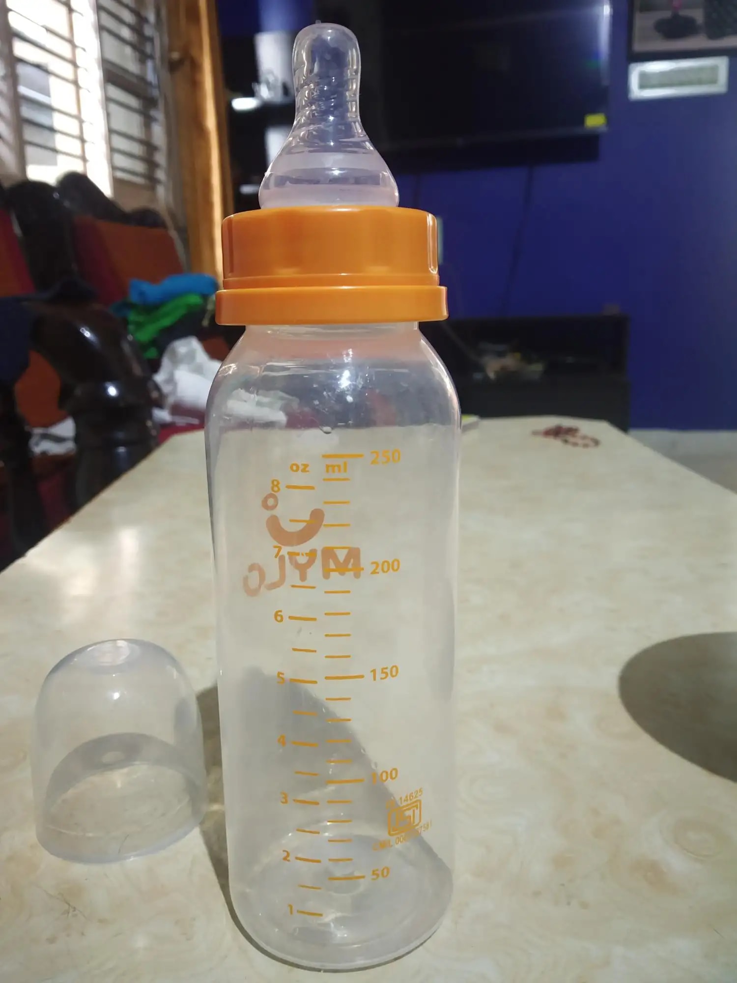 2-in-1 Baby Feeding Bottle | BPA Free with Anti-Colic Nipple & Spoon | Easy Flow Neck Design - Lion & Giraffe 125ml & 250ml