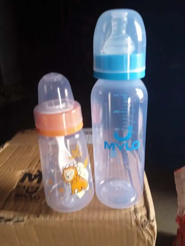 2-in-1 Baby Feeding Bottle | BPA Free with Anti-Colic Nipple & Spoon | Easy Flow Neck Design - Lion & Giraffe 125ml & 250ml