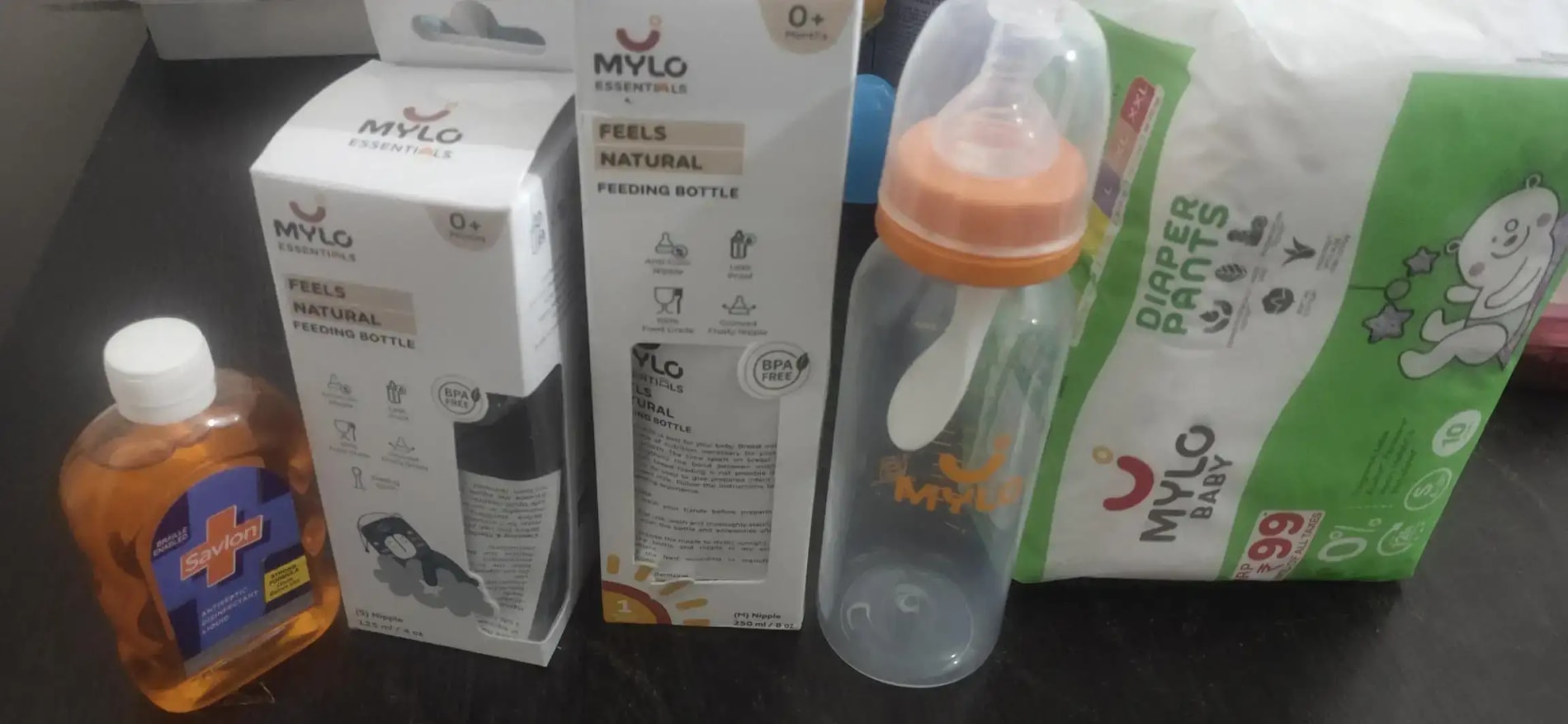 2-in-1 Baby Feeding Bottle | BPA Free with Anti-Colic Nipple & Spoon | Easy Flow Neck Design - Lion & Giraffe 125ml & 250ml
