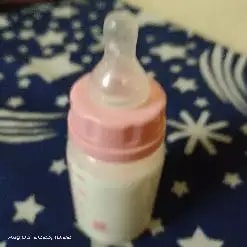 2-in-1 Baby Feeding Bottle | BPA Free with Anti-Colic Nipple & Spoon | Easy Flow Neck Design - Lion & Giraffe 125ml & 250ml